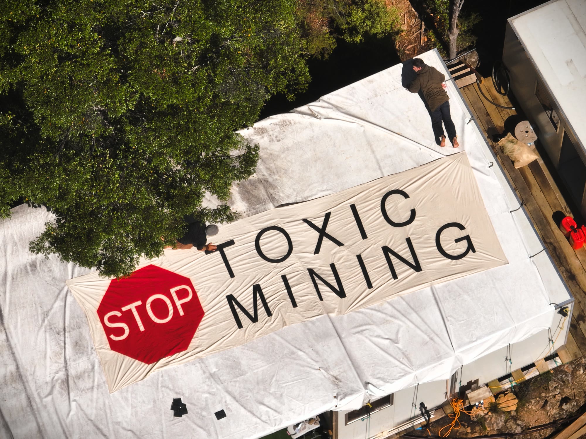Stop toxic mining. banner on the encampment