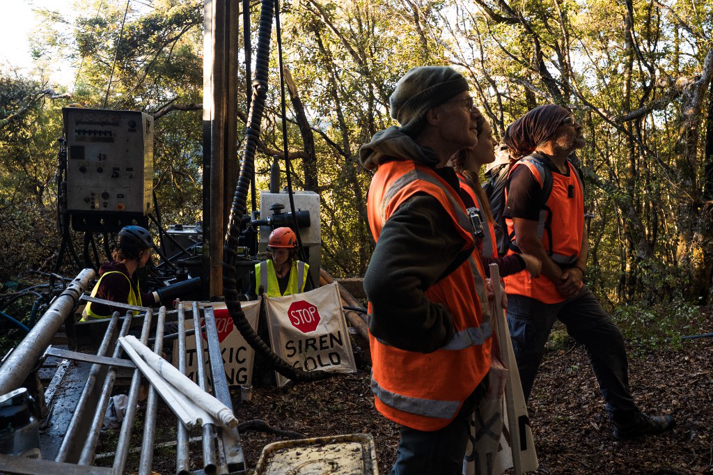 Workers arrive at the drill site